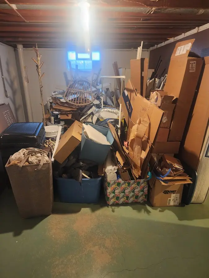 Roll-off dumpster container at job site for 2 Yard Dumpster Rental in Burrillville